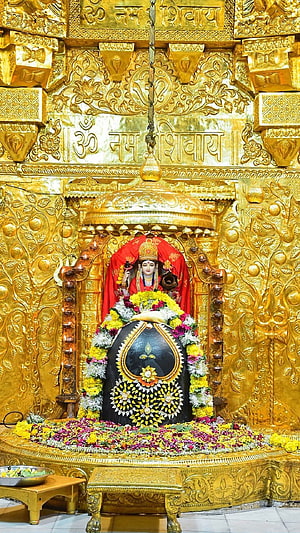 Somnath Mahadev Temple Shiva Lingam with Goddess Parvati Idol and Golden Carved Backdrop HD phone wallpaper