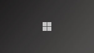 Minimalist Windows Logo on Dark Gray Background for Desktop HD wallpaper