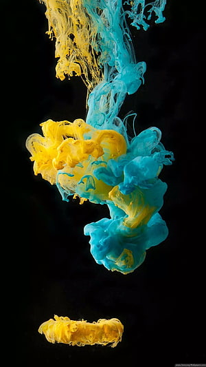 Abstract Blue and Yellow Ink Swirling in Water on Black Background HD phone wallpaper