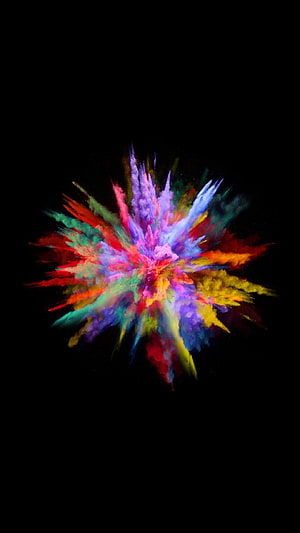 Vibrant Multicolored Powder Explosion Bursting Against a Deep Black Background HD phone wallpaper
