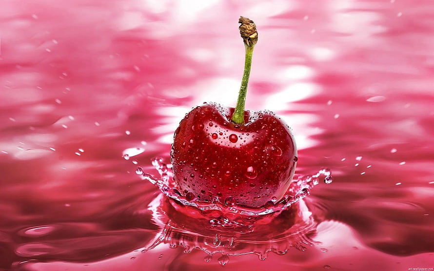 Glossy Red Cherry with Water Droplets Creating a Splash in Pink Liquid HD wallpaper