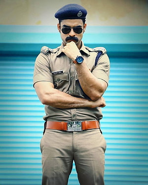 Tovino Thomas in Police Uniform with Beret and Sunglasses HD phone wallpaper