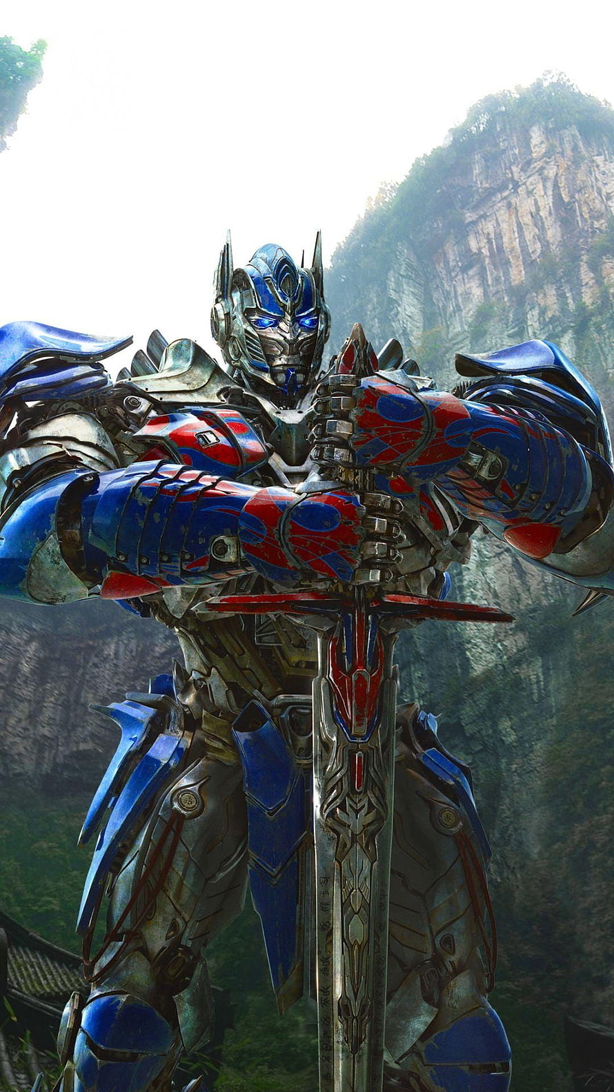 Optimus Prime wielding sword in Transformers movie scene HD phone wallpaper