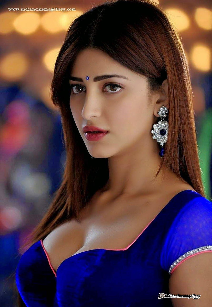 Shruti Haasan in a Royal Blue Velvet Dress with Traditional Indian Jewelry HD phone wallpaper