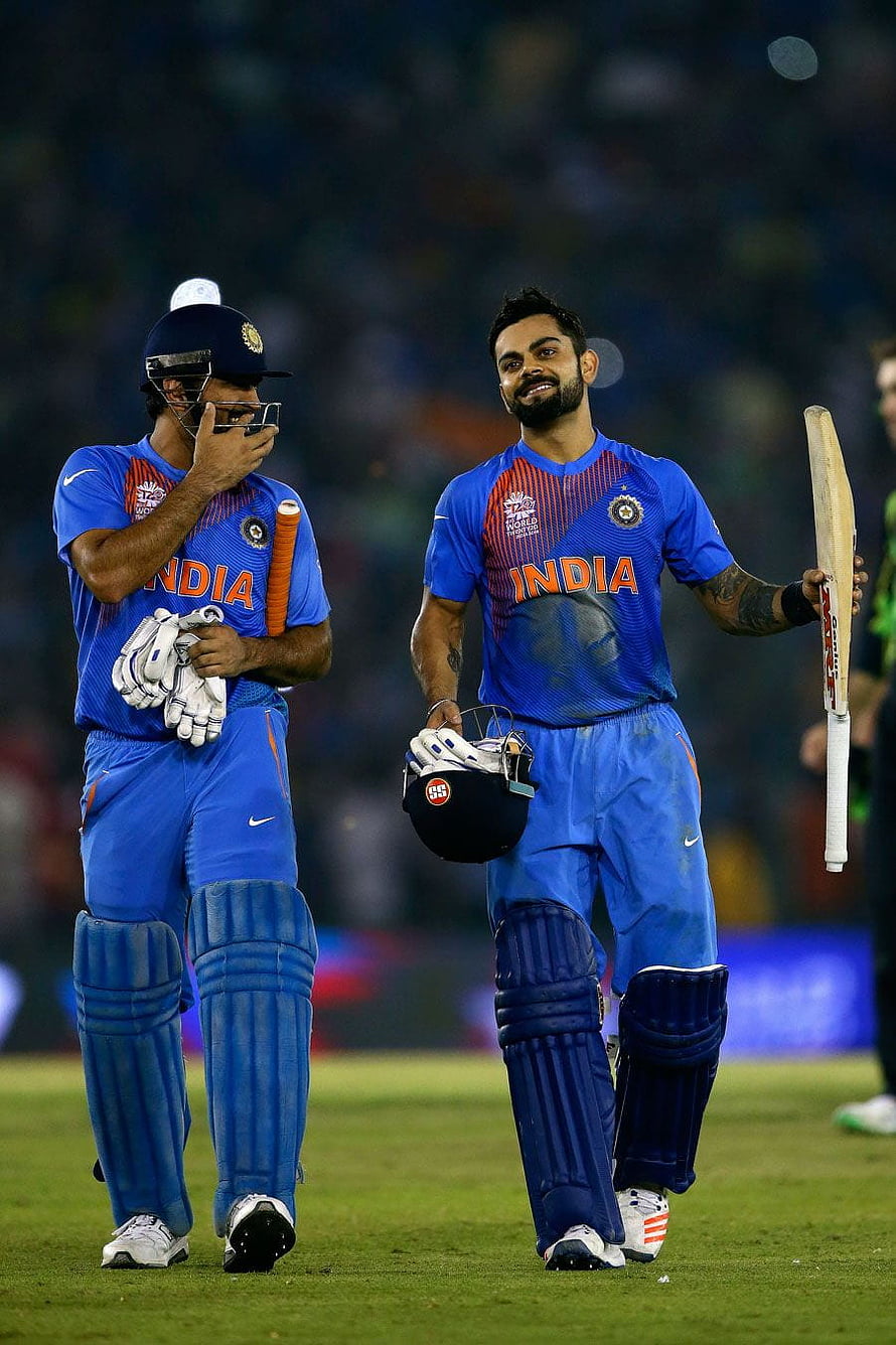 Virat Kohli and MS Dhoni walk off the field in India cricket team blue ODI uniforms HD phone wallpaper