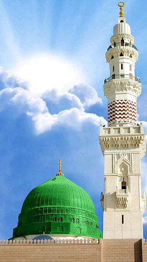 Prophet's Mosque in Medina with Green Dome and Minaret Under Blue Sky HD phone wallpaper