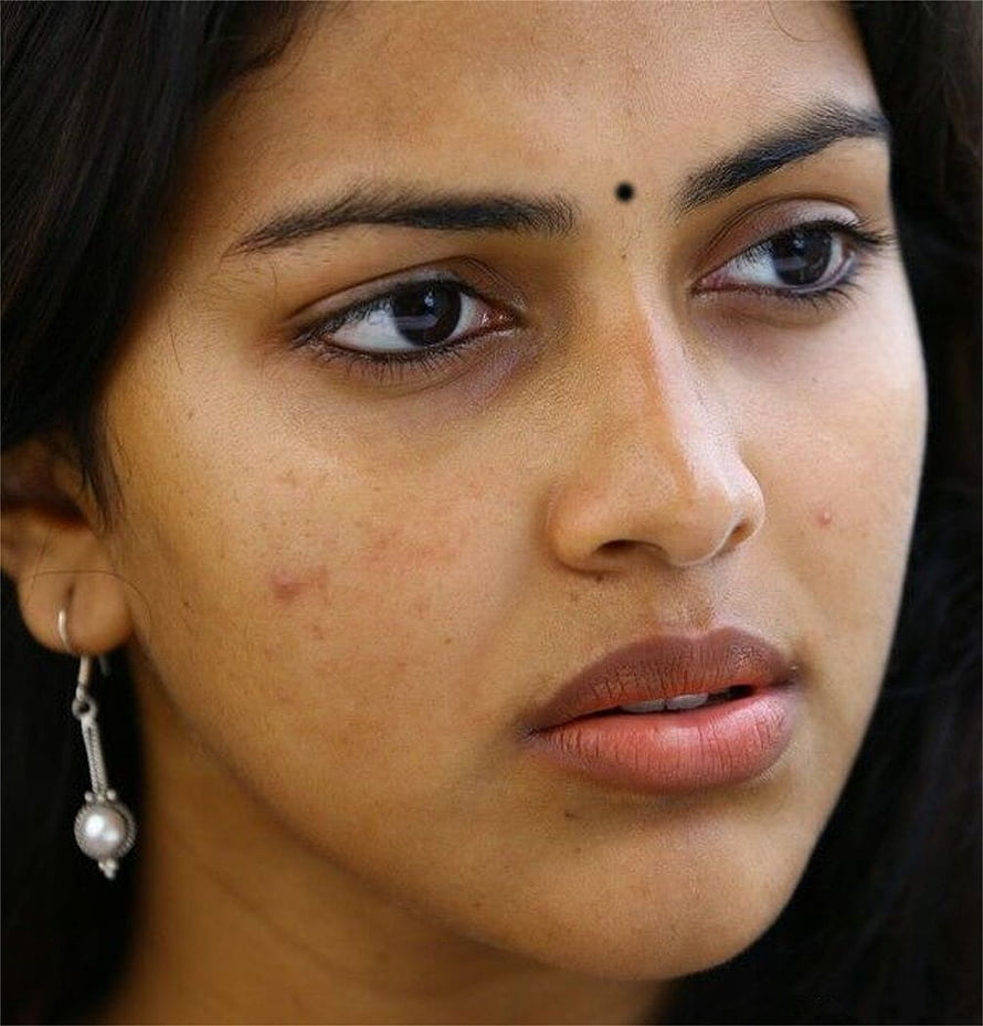 Close-up portrait of a young woman with a bindi and pearl earrings, Tamil Actress Amala Paul Without Makeup Face Closeup With Glass, tamil actress close up face HD phone wallpaper