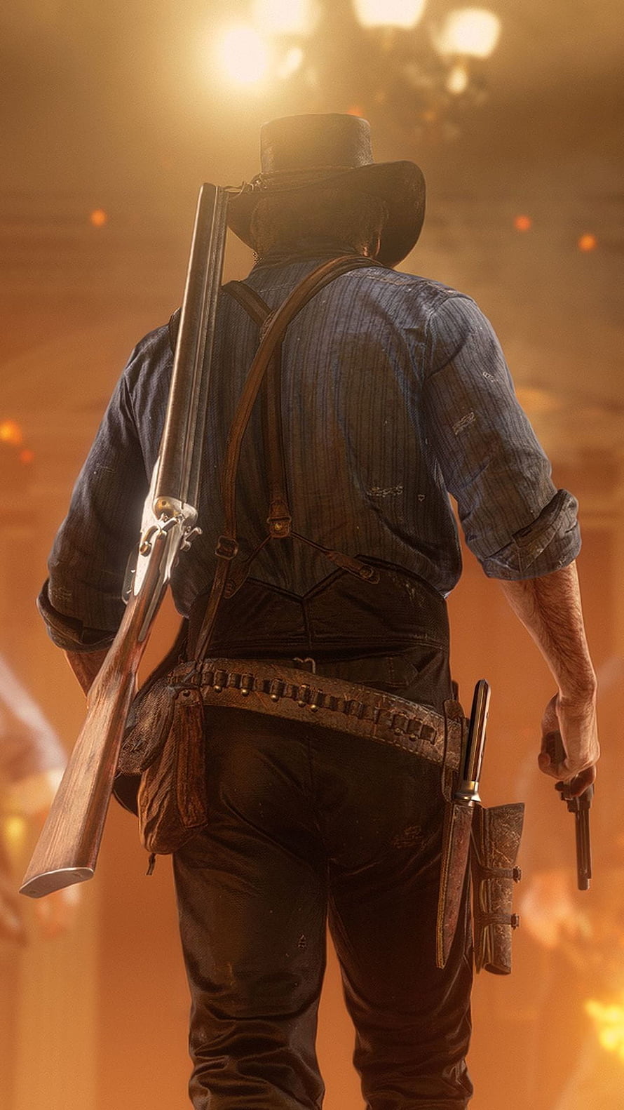 Red Dead Redemption 2 cowboy silhouette with rifle and revolver against fiery sunset backdrop HD phone wallpaper