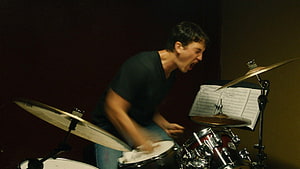 Miles Teller as Drummer in Whiplash Movie Scene HD wallpaper
