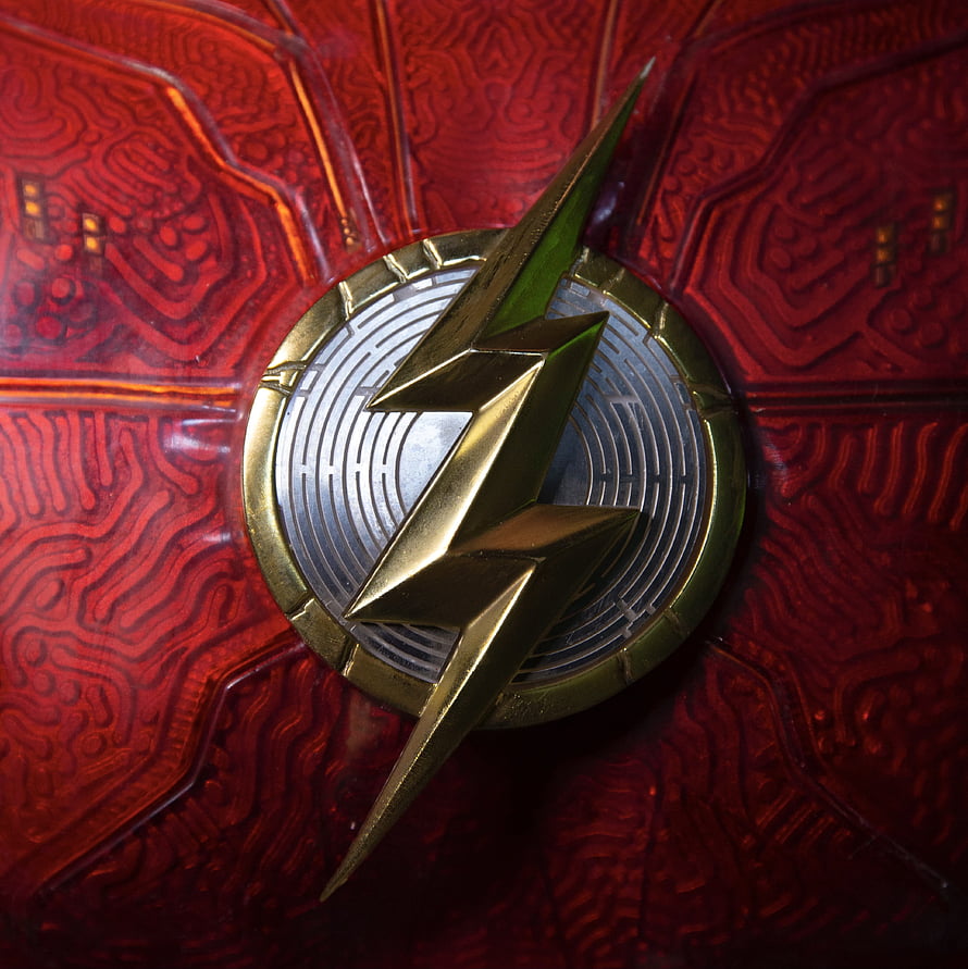 The Flash 2023 Movie Emblem Close-Up on Red Textured Suit HD phone wallpaper