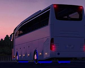 Customized White Coach Bus with Blue Underglow at Sunset HD wallpaper