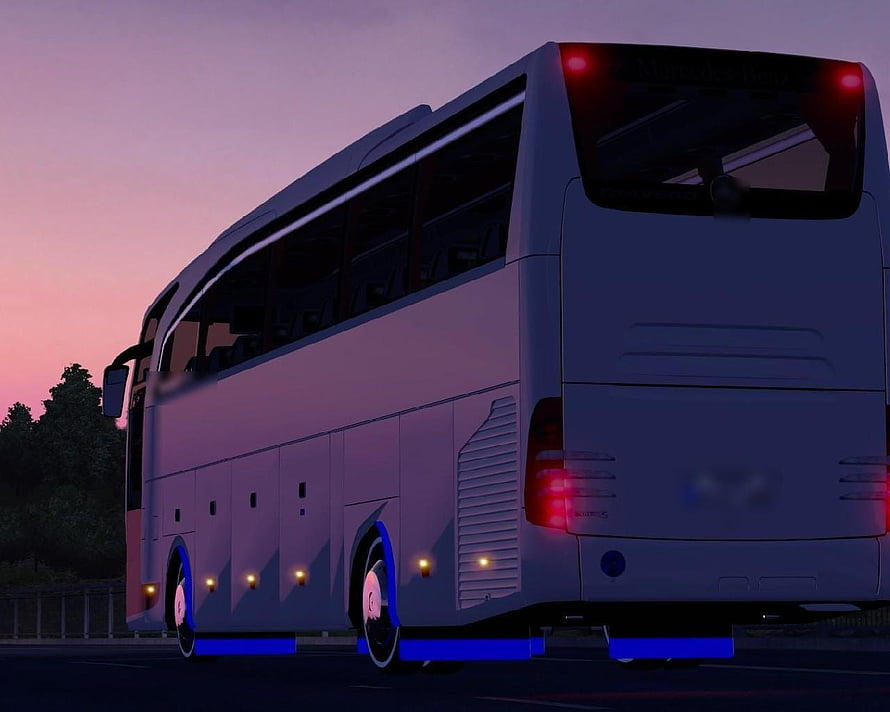 Customized White Coach Bus with Blue Underglow at Sunset HD wallpaper