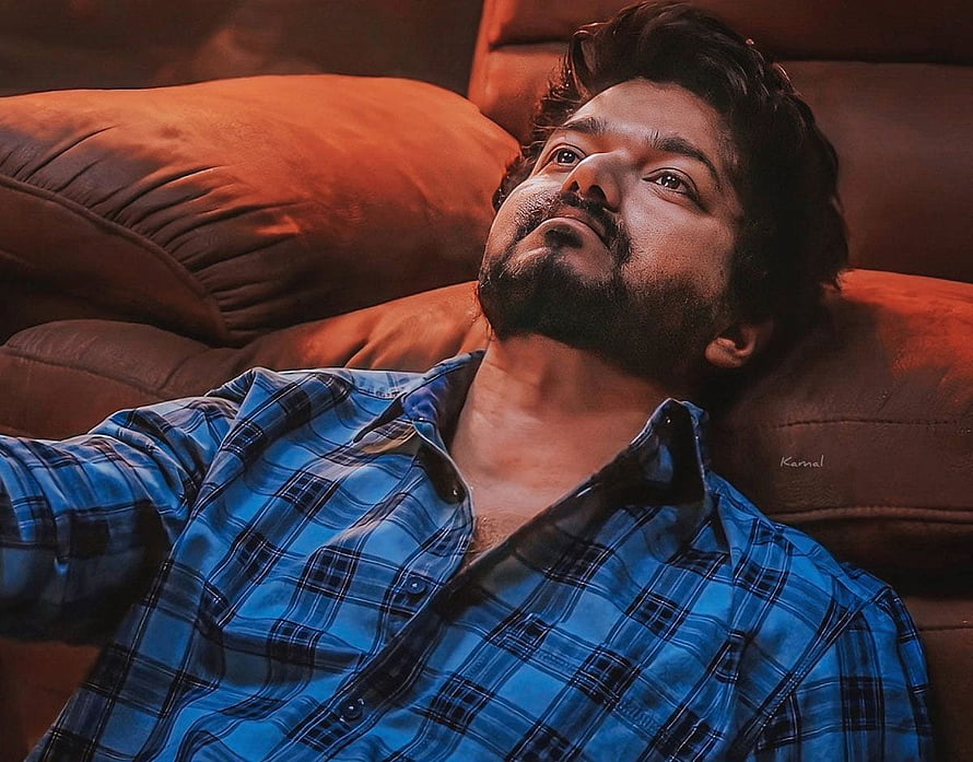 Vishal Vishal in Blue Plaid Shirt Lying on Brown Sofa HD wallpaper