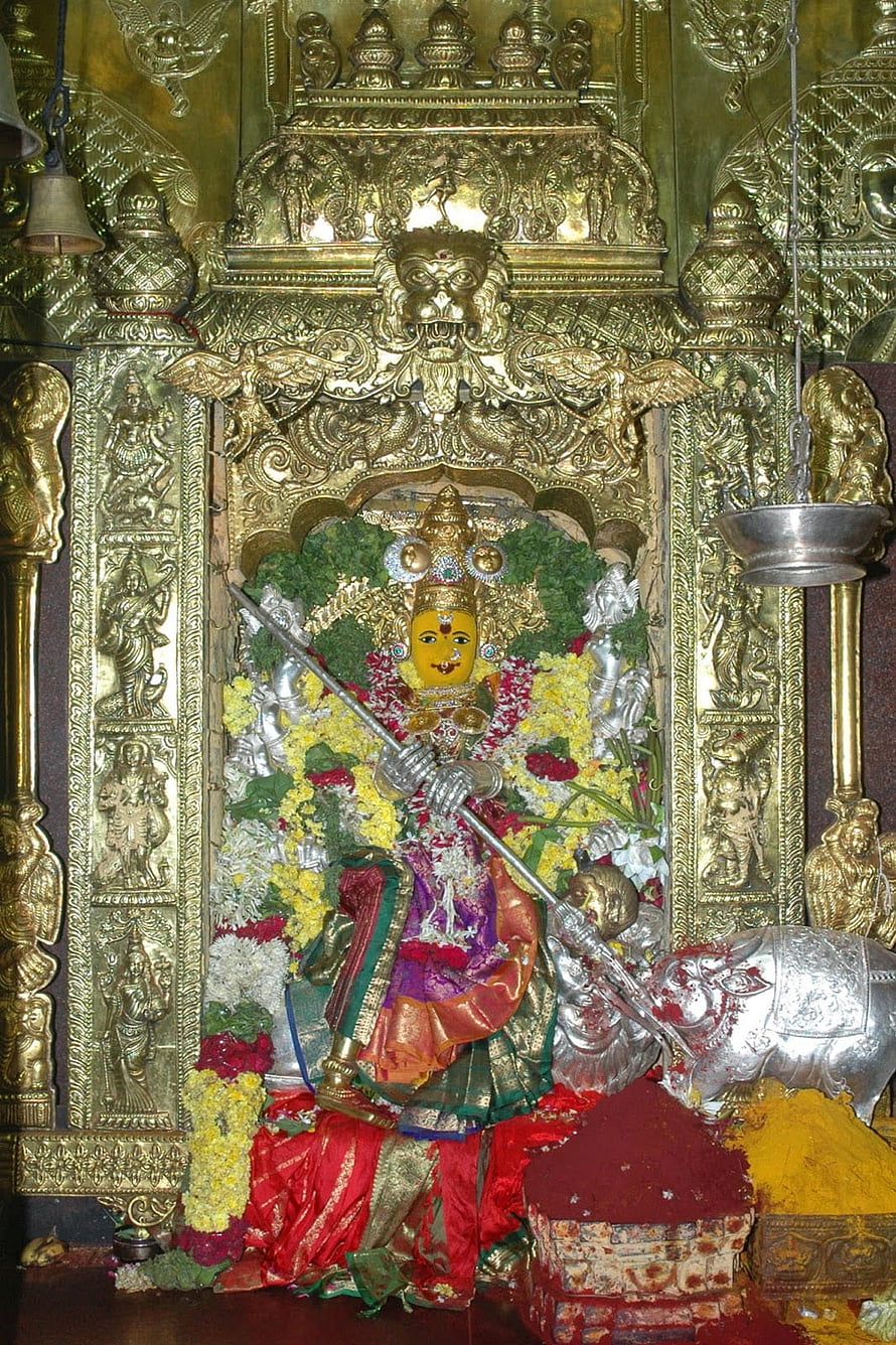 Golden Goddess Durga Statue Slaying Demon Mahishasura in Temple Shrine HD phone wallpaper