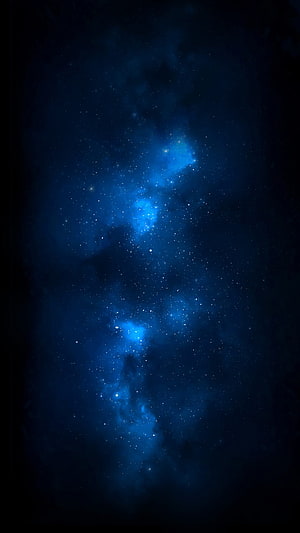 Deep Space Blue Nebula and Star Field Against Dark Cosmic Background HD phone wallpaper