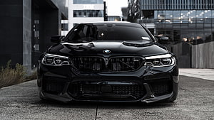 Black BMW M5 F90 Front View Parked in Urban Setting HD wallpaper