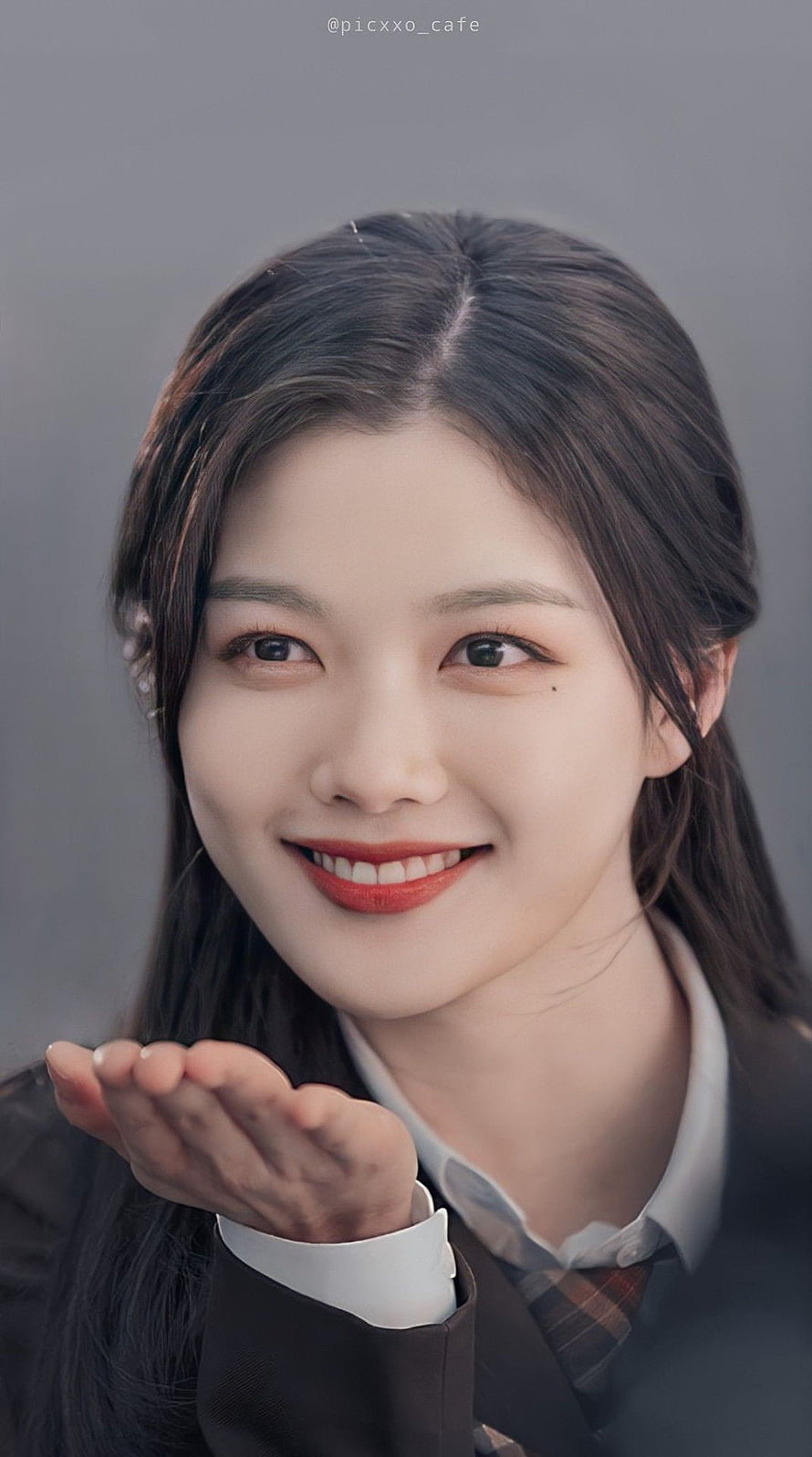 Kim Yoo Jung in School Uniform Blowing a Kiss with Warm Smile HD phone wallpaper