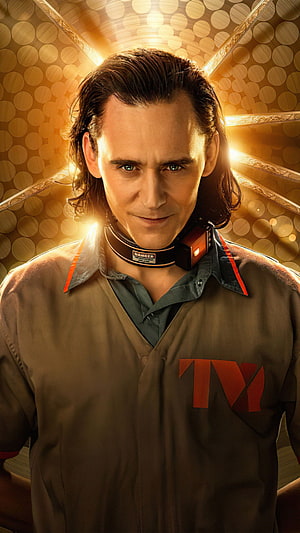 Loki in TVA Uniform with Collar Device Against Golden Bokeh Background HD phone wallpaper