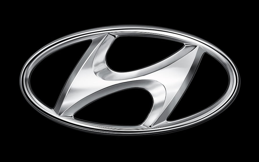 Sleek Chrome Hyundai Emblem on Black Background HD wallpaper