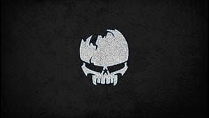 Gothic Skull Emblem on Dark Textured Background for Gaming Desktop HD wallpaper