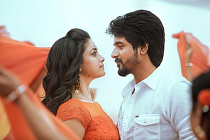 Sivakarthikeyan and Keerthi Suresh in a romantic close-up from the film Remo HD wallpaper