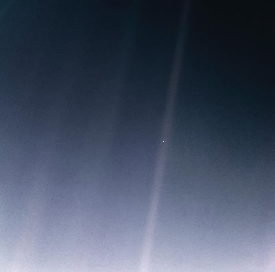 Pale Blue Dot Earth Photograph Against Deep Space Darkness HD wallpaper