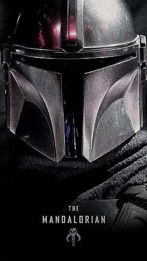 The Mandalorian Helmet Close-Up with Dark Armor and Dramatic Lighting HD phone wallpaper