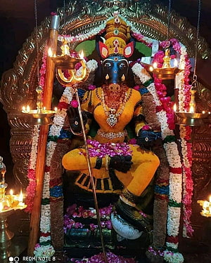 Ganesh Chaturthi Murti Decorated With Flowers And Oil Lamps HD phone wallpaper
