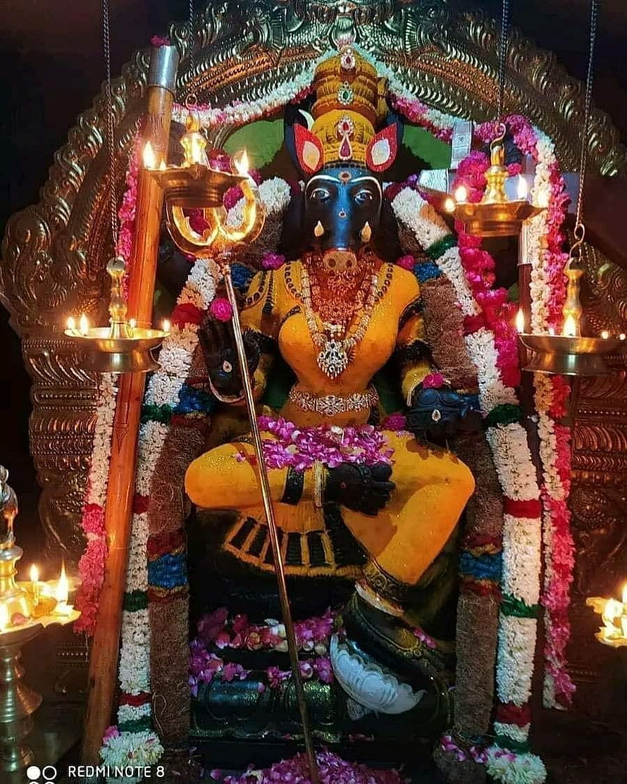 Ganesh Chaturthi Murti Decorated With Flowers And Oil Lamps HD phone wallpaper
