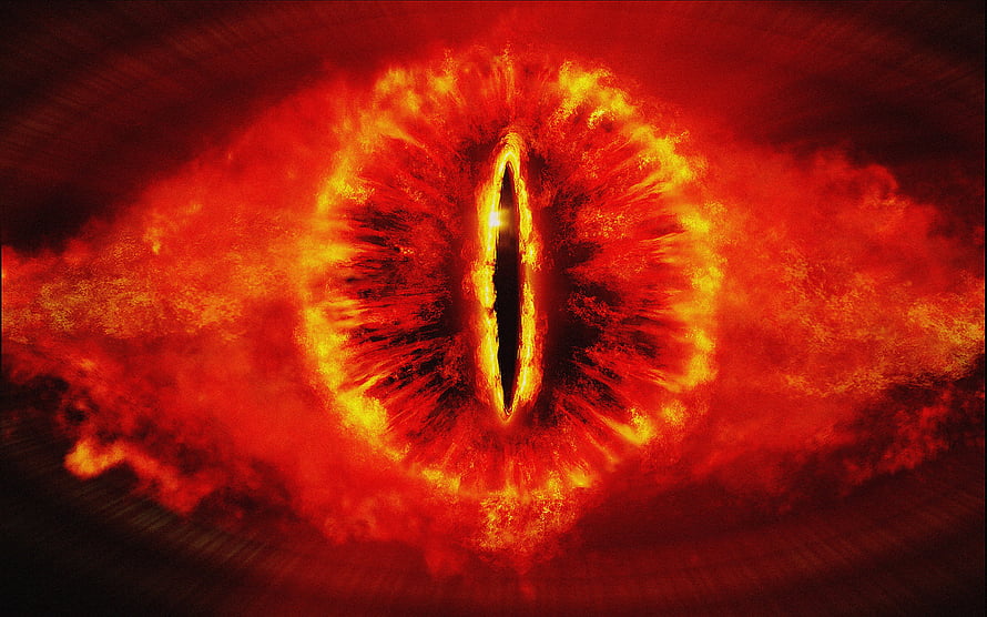 Fiery Dragon Eye With Vertical Slit Pupil And Glowing Orange Iris HD wallpaper