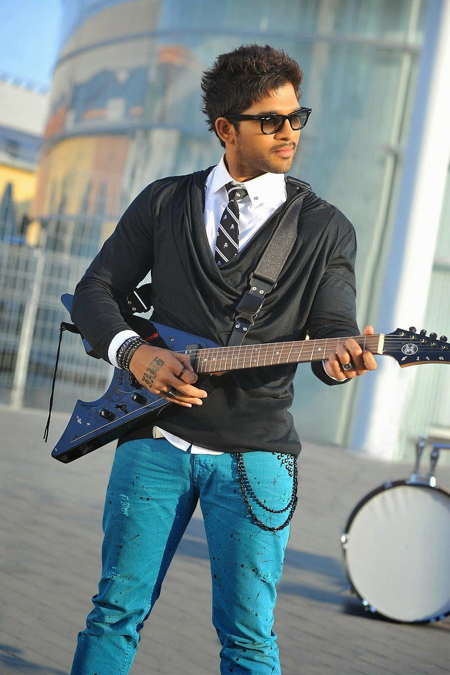 Allu Arjun Playing Electric Guitar in Stylish Black and Turquoise Outfit HD phone wallpaper