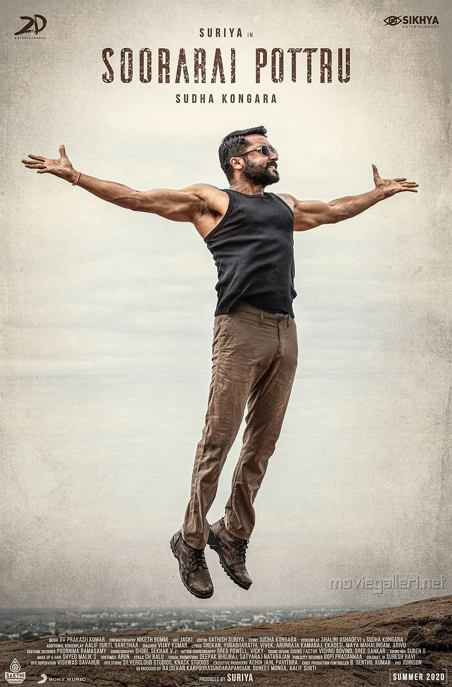 Suriya Soorarai Pottru Movie Poster with Arms Outstretched Against Sky HD phone wallpaper