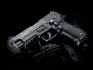 Sig Sauer P226 Stainless Pistol with Tactical Accessories on Black Background HD wallpaper