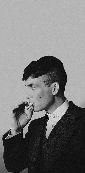 Thomas Shelby from Peaky Blinders smoking cigarette in black and white portrait HD phone wallpaper