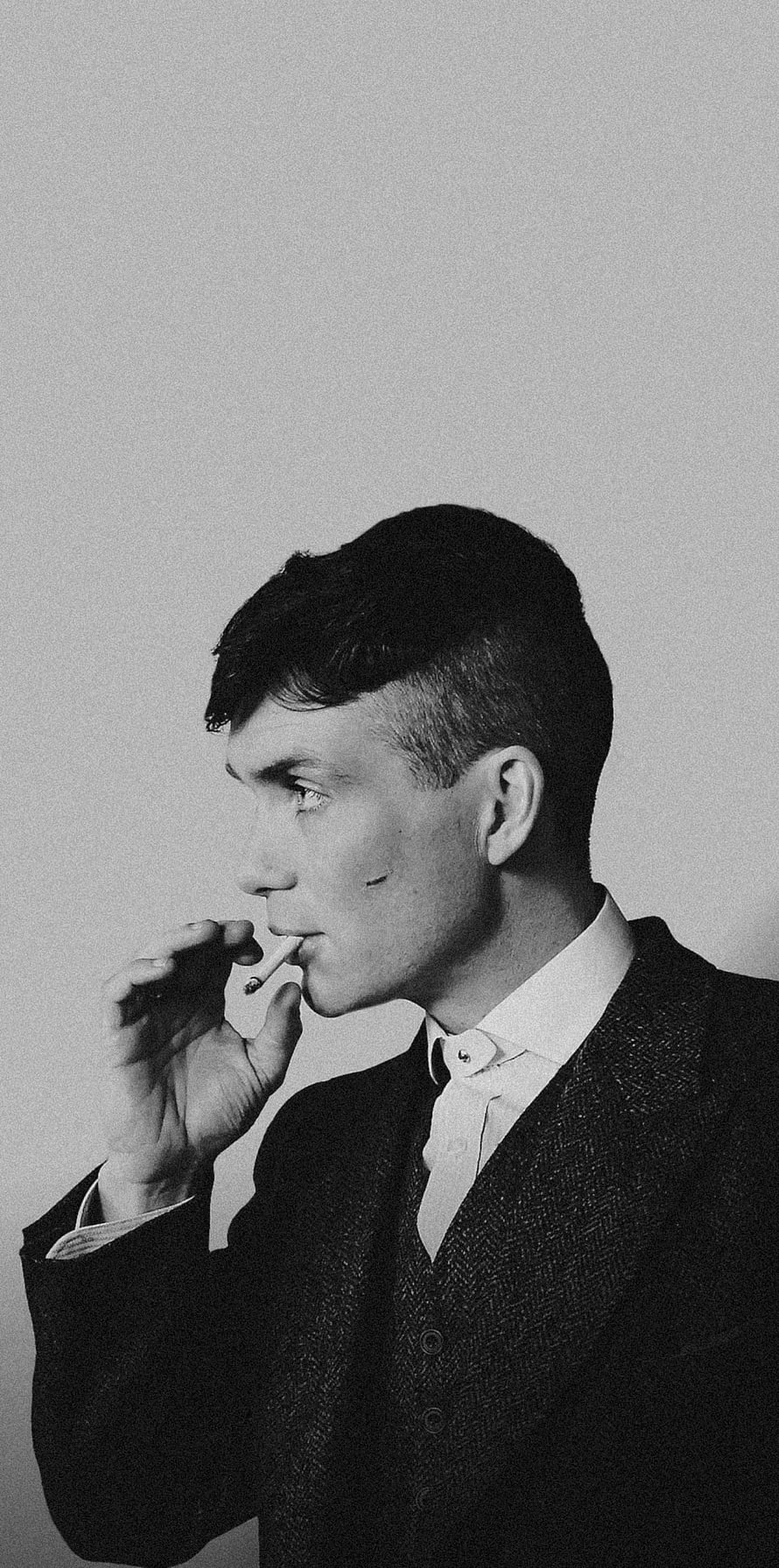 Thomas Shelby from Peaky Blinders smoking cigarette in black and white portrait HD phone wallpaper