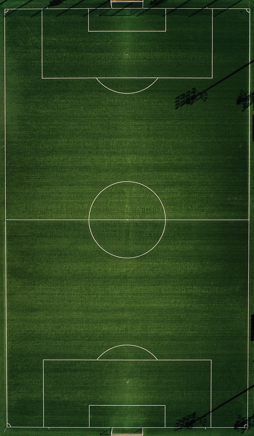 Aerial View of Green Soccer Field with White Lines and Center Circle HD phone wallpaper