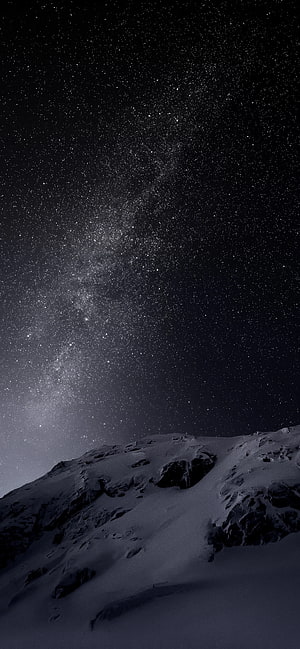 Stunning Milky Way Galaxy Over Snowy Mountain Ridge at Night HD phone wallpaper