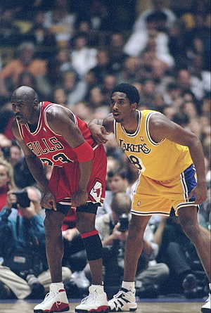 Michael Jordan and Kobe Bryant Face Off in Classic NBA Matchup HD phone wallpaper