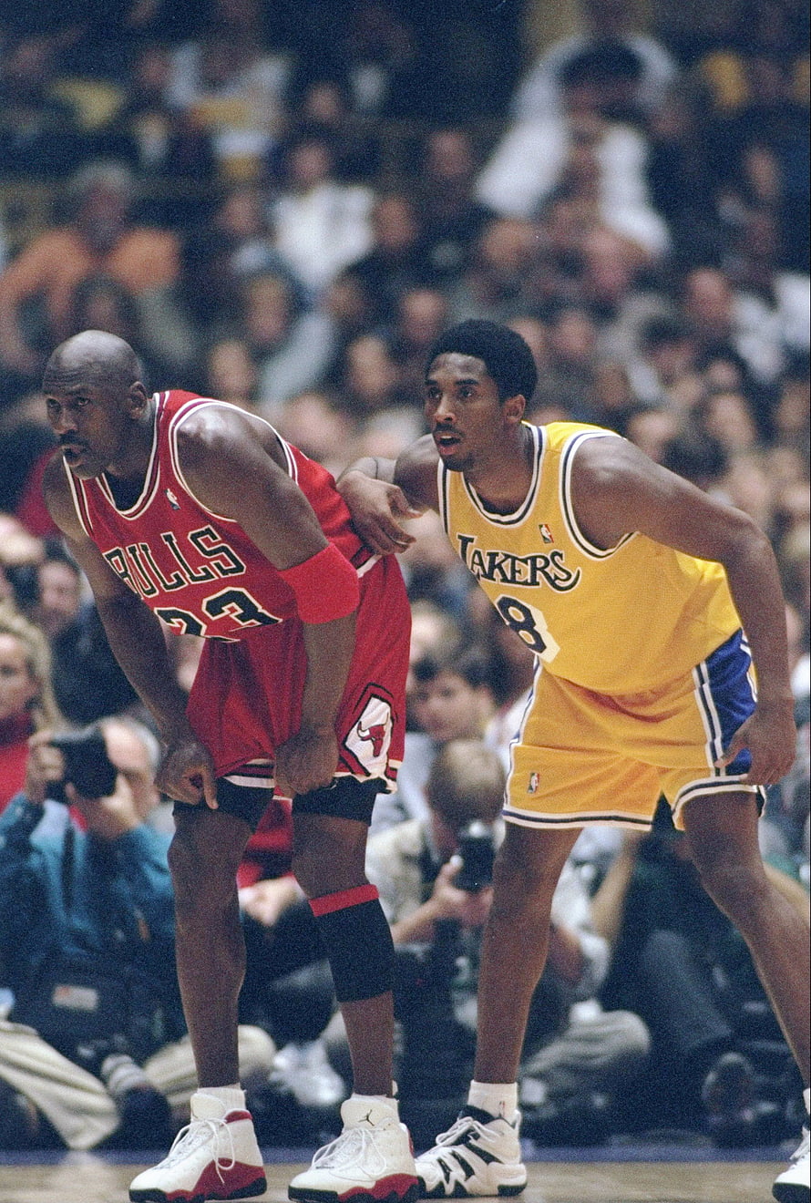 Michael Jordan and Kobe Bryant Face Off in Classic NBA Matchup HD phone wallpaper