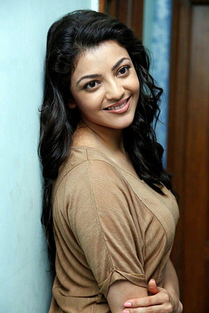 Kajal Agarwal Portrait in Earth-Tone Top with Soft Indoor Lighting HD phone wallpaper