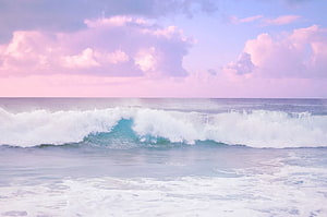 Pastel Pink Sky Over Turquoise Ocean Waves at the Beach HD wallpaper