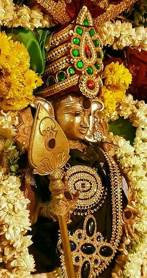 Golden Statue of Lord Ayyappa Adorned with Jewels and Flowers HD phone wallpaper