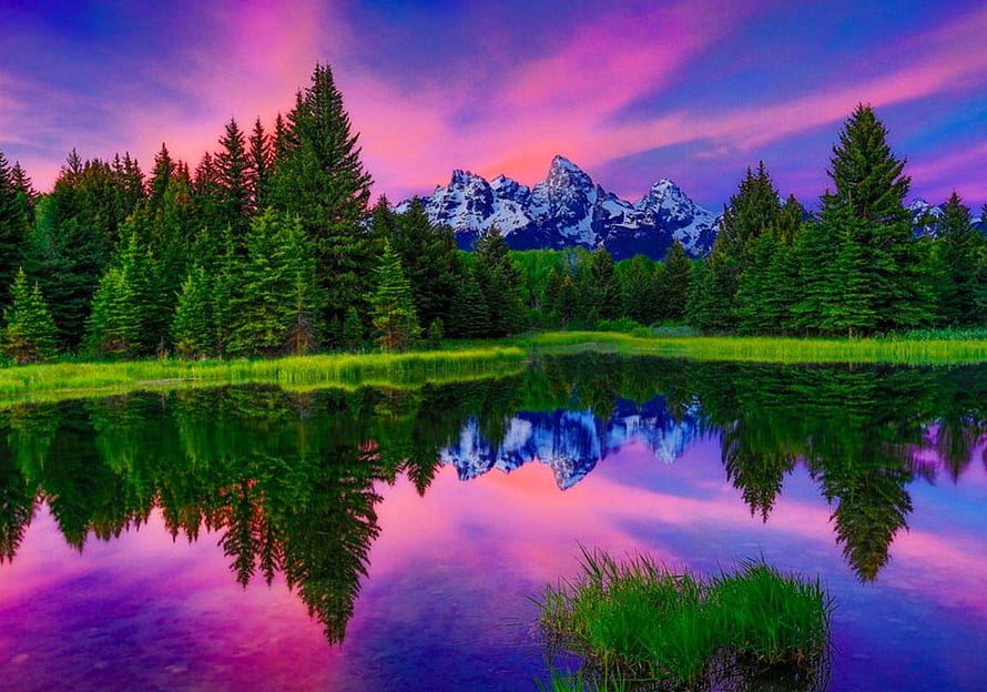 Vibrant Sunset Reflection of Snow-Capped Mountains and Pine Forest in a Calm Alpine Lake HD wallpaper