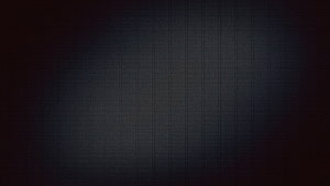 Dark Textured Gradient Background with Subtle Dot Pattern and Vignette Effect HD wallpaper
