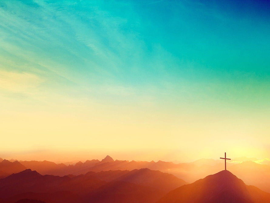 Silhouette of a Christian Cross on a Mountain Peak at Sunset HD wallpaper