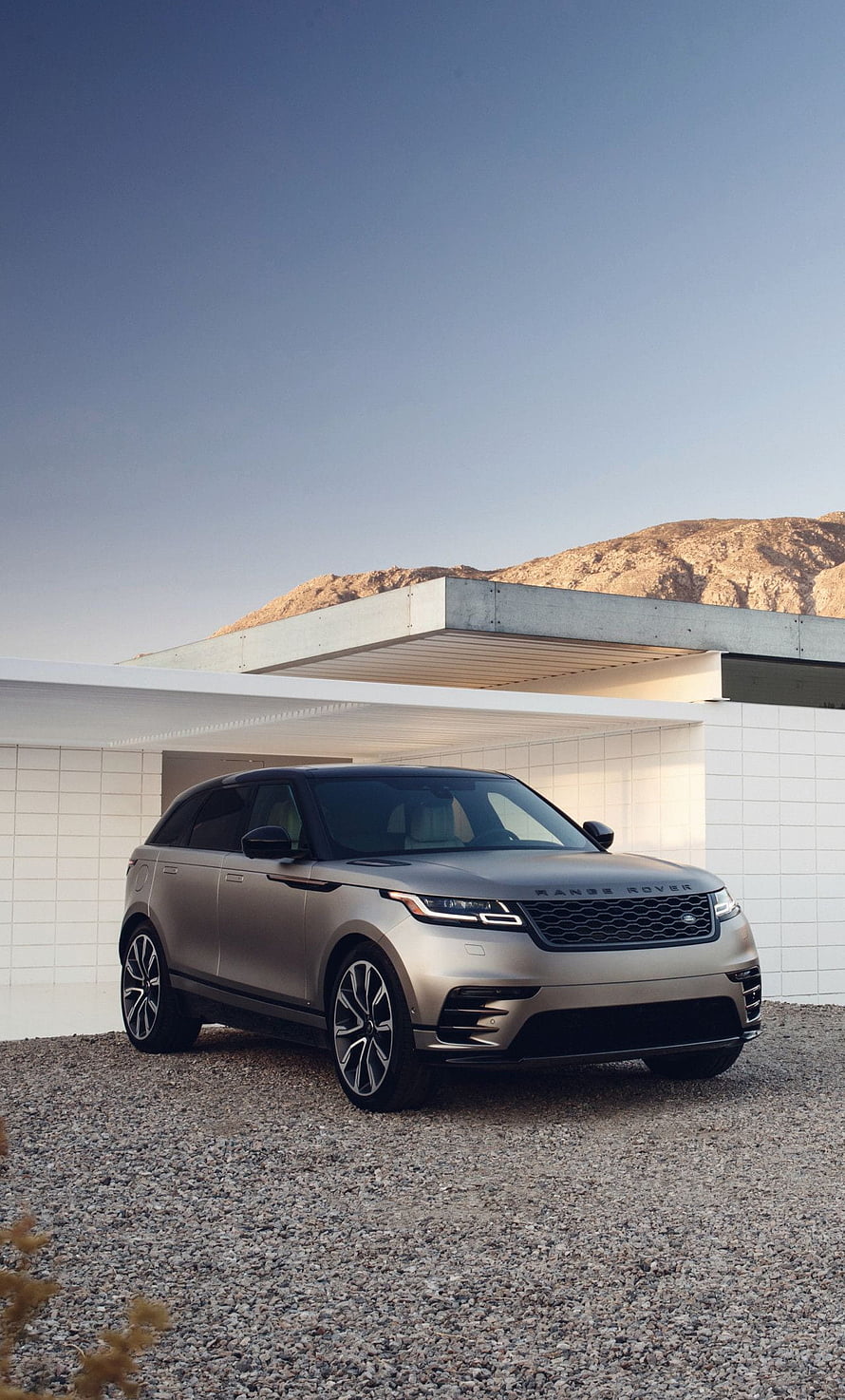 Silver Range Rover Velar SUV Parked in Front of Modern Minimalist Architecture HD phone wallpaper