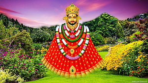 Baba Shyam in ornate red attire and golden crown standing in a vibrant flower garden HD wallpaper
