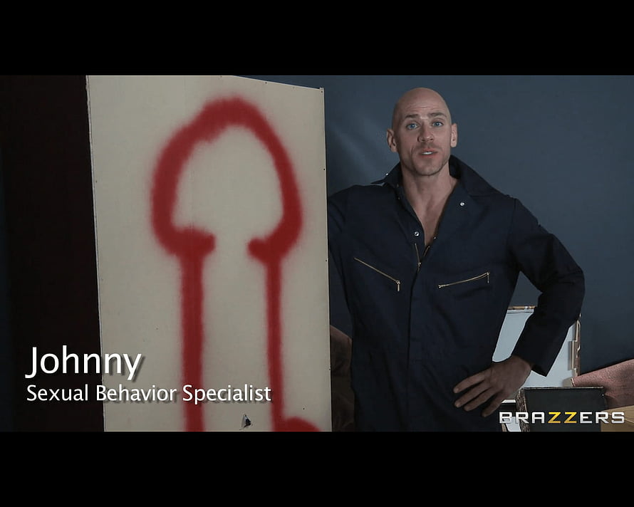 Johnny Sins in Dark Workwear Standing Beside Red Spray Painted Keyhole on White Panel HD wallpaper
