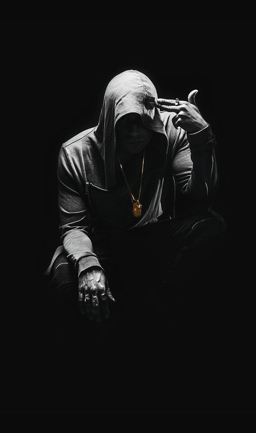 Stefan Mara in a dark hooded portrait with a gold chain and cigarette HD phone wallpaper