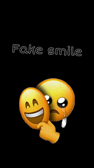 Sad Emoji Hiding Behind a Fake Smile Mask on Black Background HD phone wallpaper